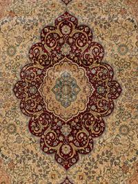 A Signed Tabriz Silk Rug