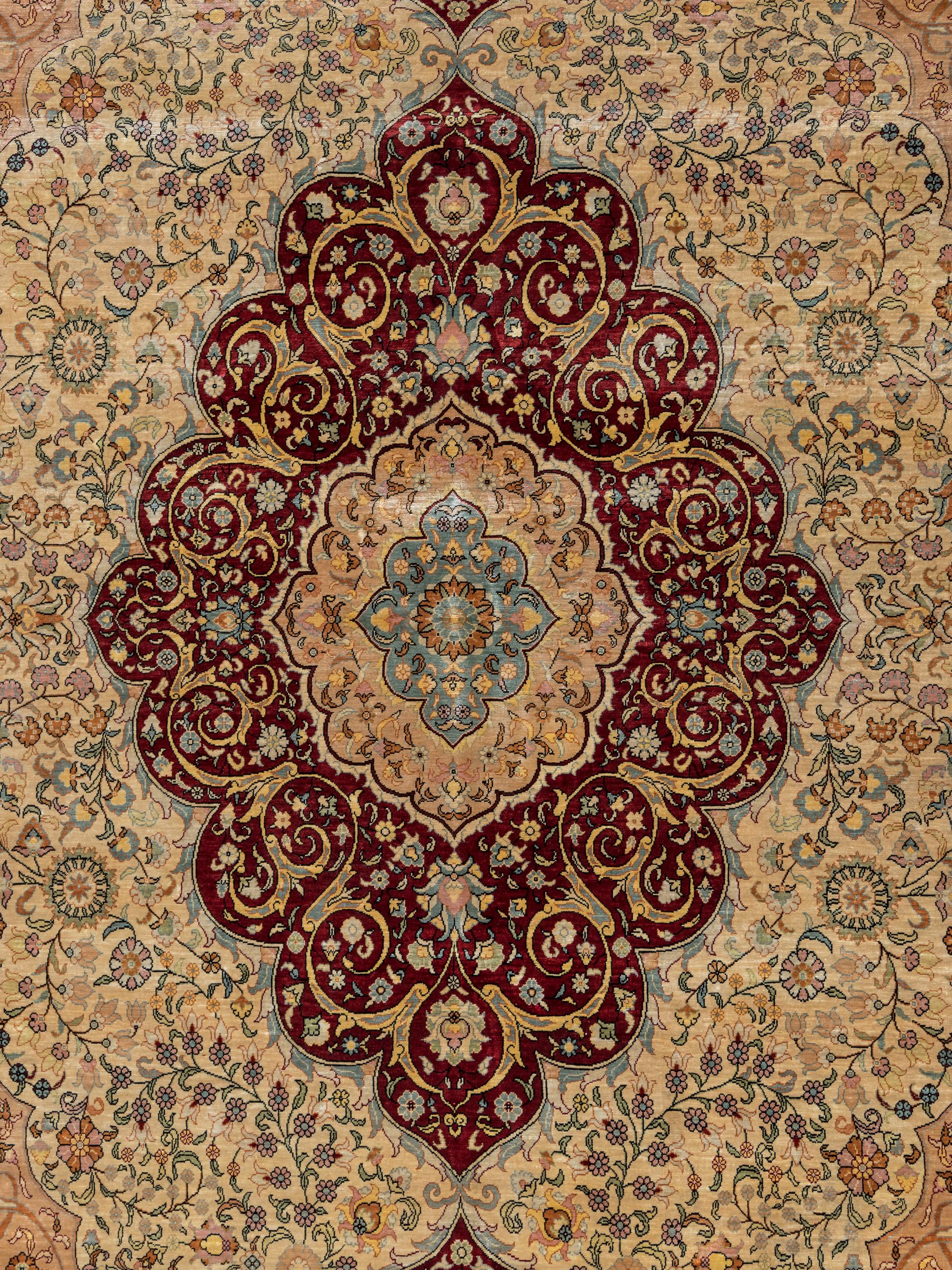 A Signed Tabriz Silk Rug