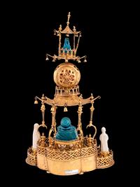 A Louis XV Style Gilt Bronze and Chinese Porcelain Mounted Pagoda-Form Mantel Clock
