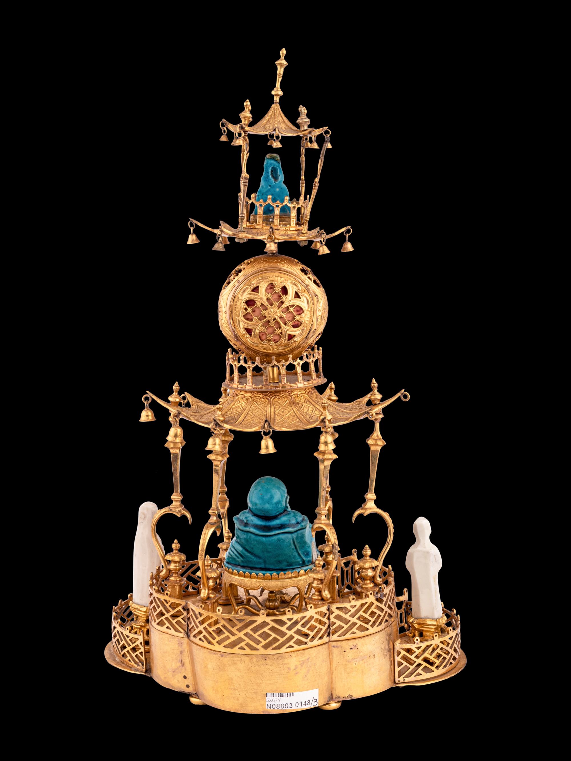 A Louis XV Style Gilt Bronze and Chinese Porcelain Mounted Pagoda-Form Mantel Clock