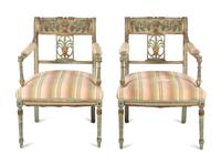 A Pair of Neoclassical Painted and Parcel Gilt Armchairs