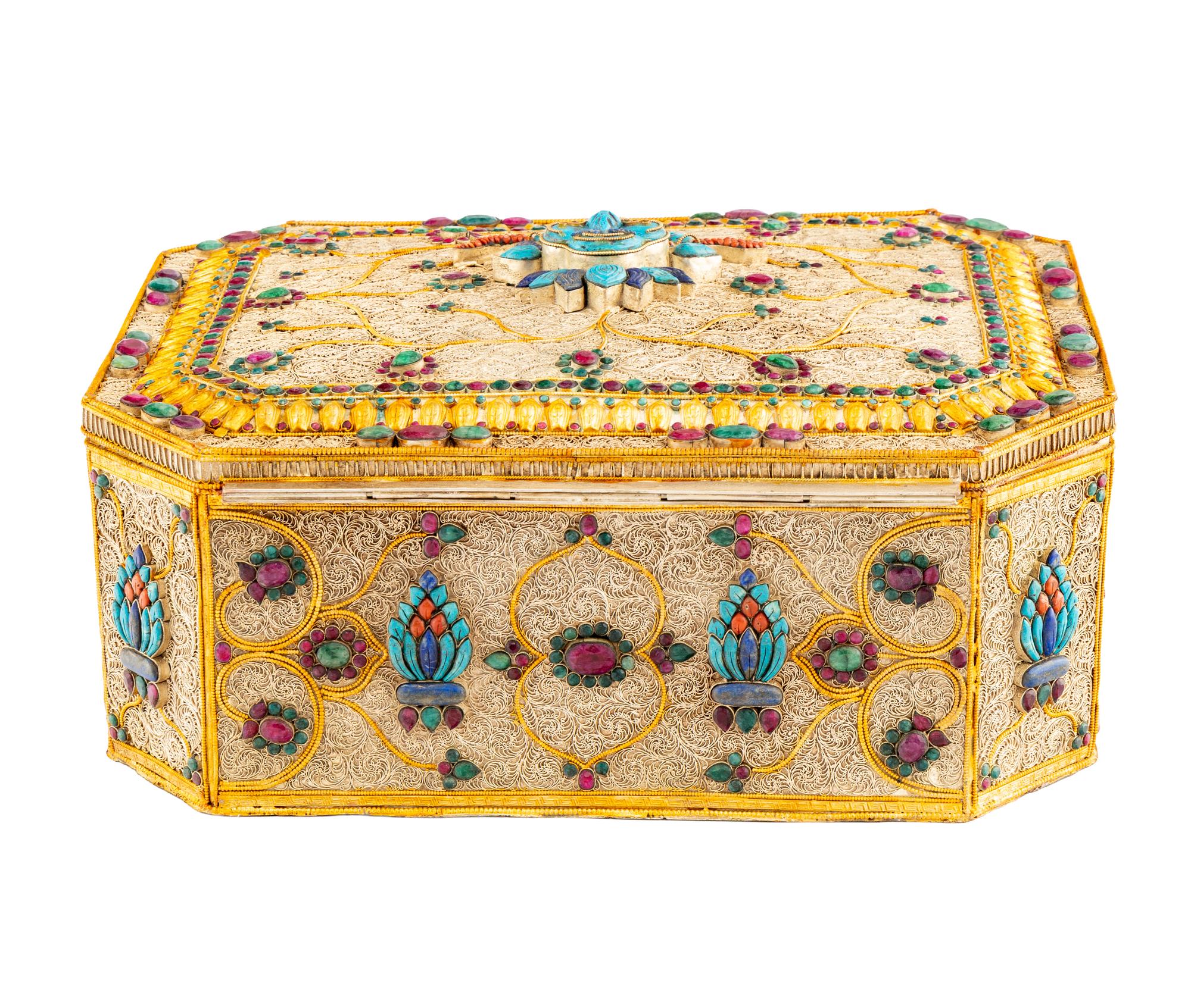 A Large Silvered and Gilt Filigree and Jeweled Box