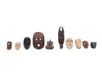 A Group of Ten Carved Ethnographic Masks