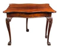 A George II Style Mahogany Flip-Top Table Height 28 1/2 x width 36 1/4 x depth 36 1/4 inches (open). — 19TH CENTURY