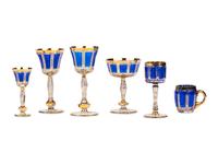 A Set of Moser Cobalt Blue and Gilt Decorated Glass Stemware