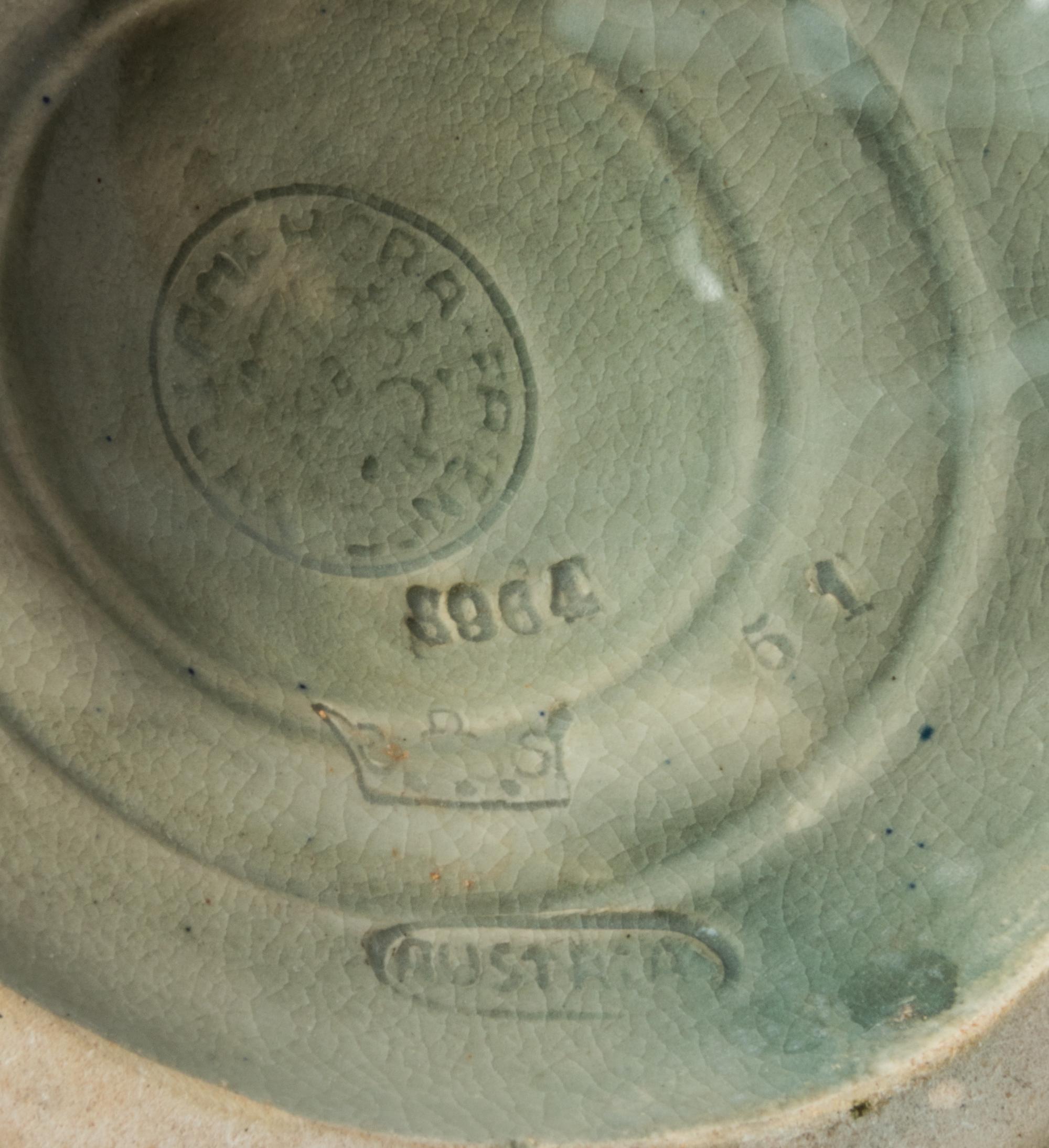 Amphora: Riessner, Stellmacher and Kessel, c.1905, handled vase, of bottled form depicting daisies