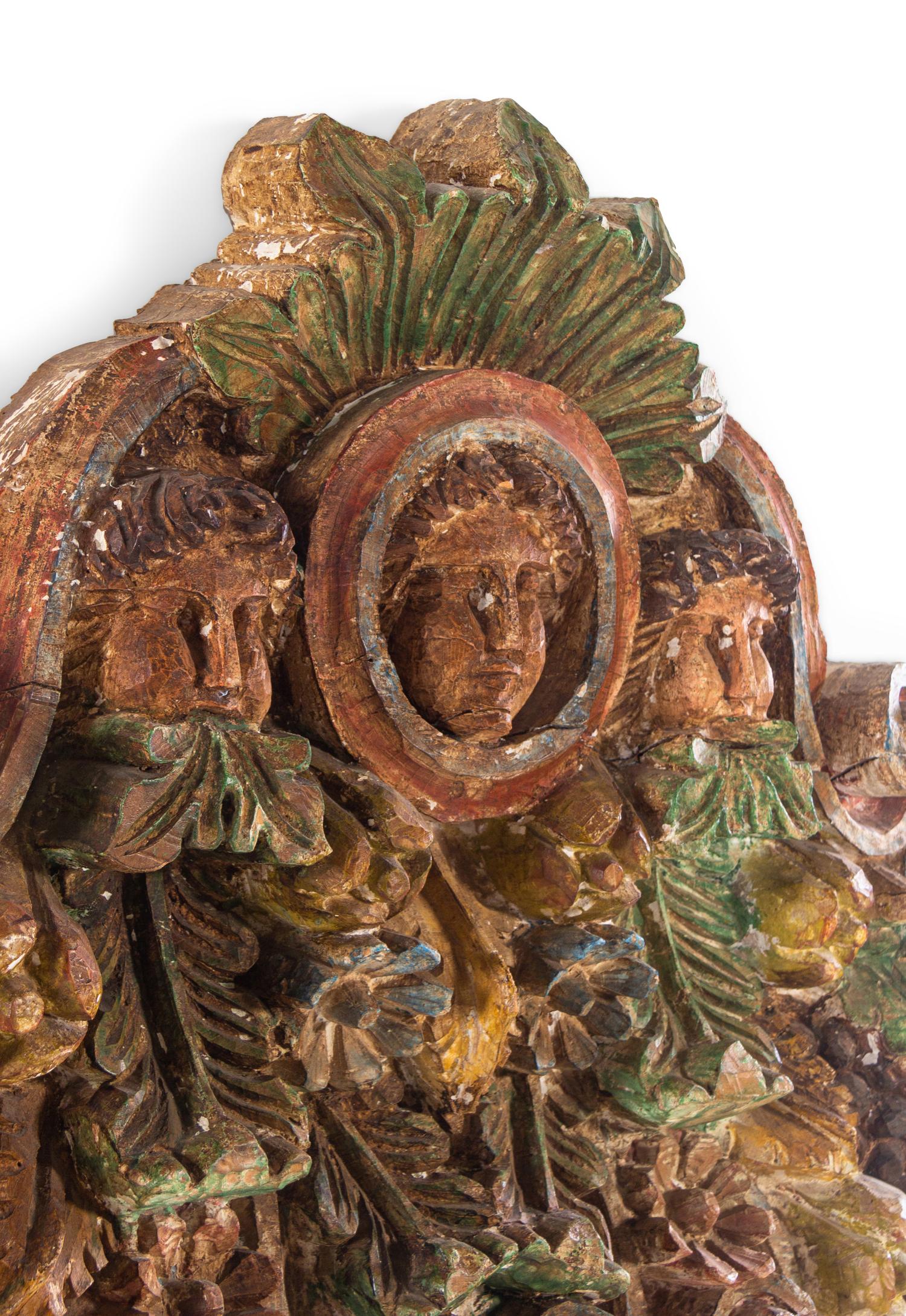 A Continental Polychrome Transom Ornament