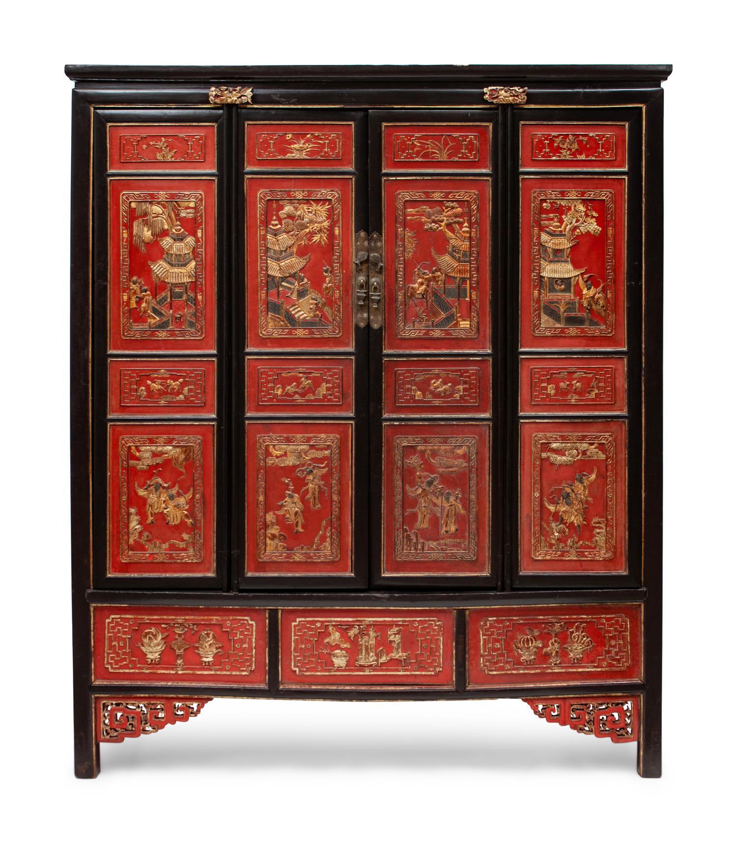 A Chinese Export Parcel Gilt and Red Lacquered Cabinet