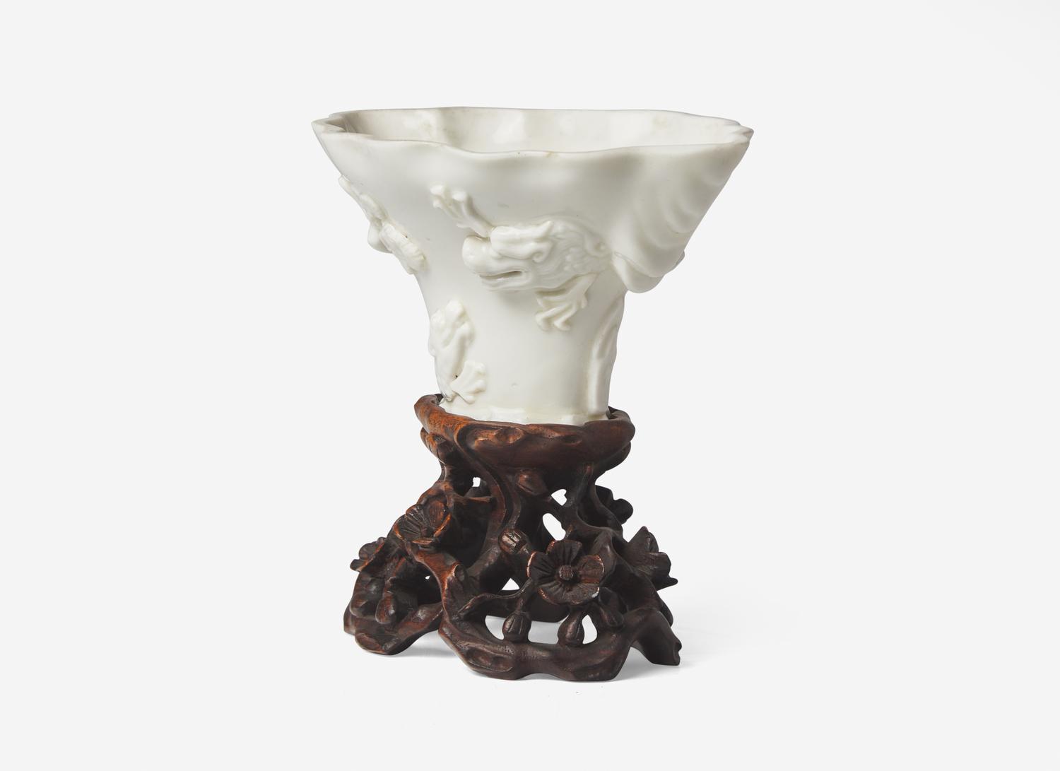 Three Chinese Dehua Porcelain Libation Cups and a Wood Stand