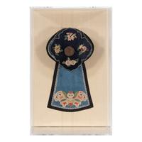 A Chinese Apricot Ground Embroidered Silk Apron Skirt and A Blue Ground Embroidered Silk Hat, 19th Century — 晚清 杏色地繡牡丹紋馬面裙及藍底繡瓜果紋帽