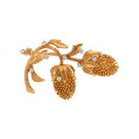 CARL D. LINDSTROM, YELLOW GOLD AND DIAMOND BROOCH