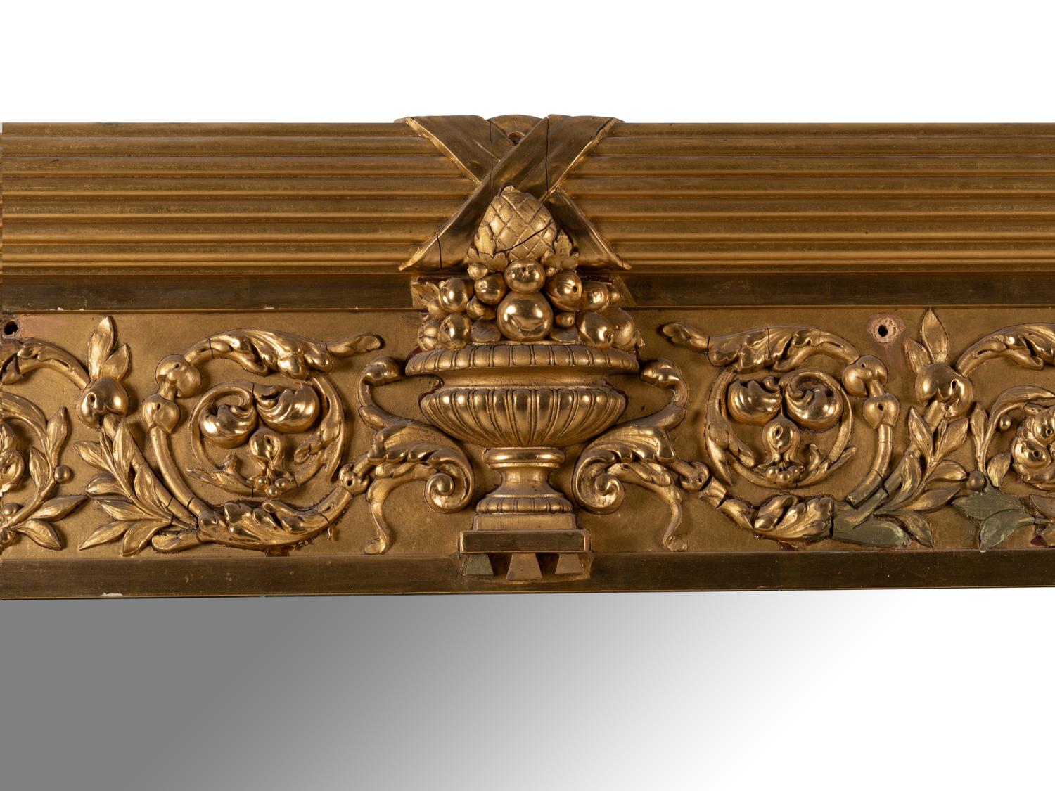A Large Neoclassical Style Giltwood Mirror