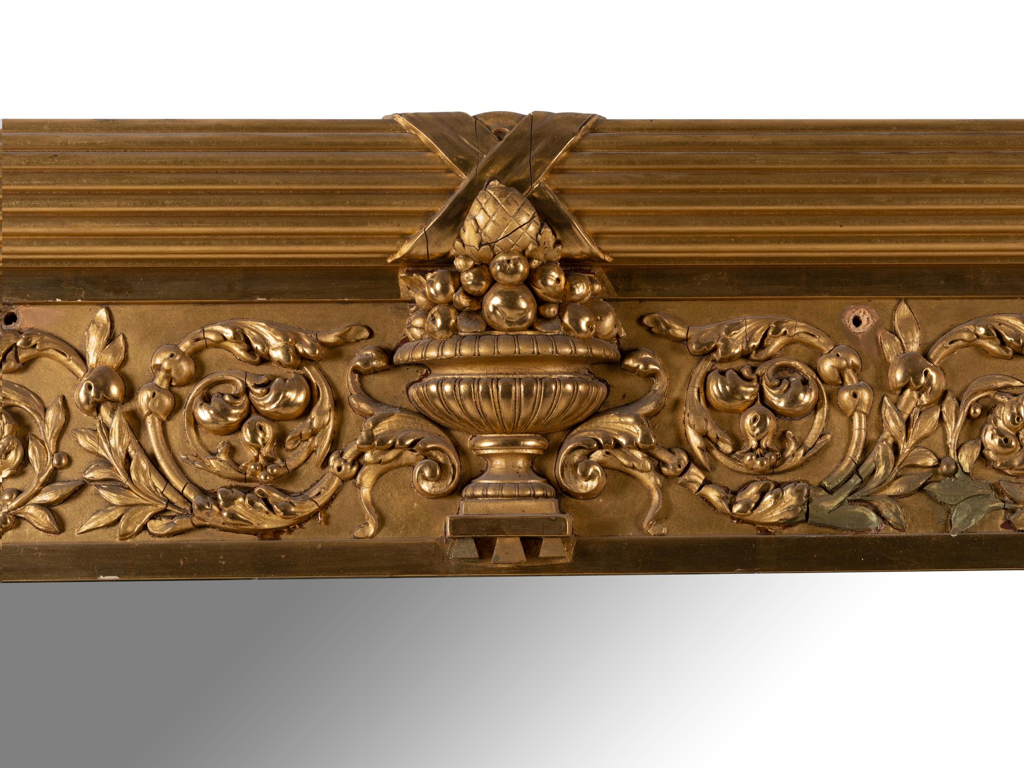 A Large Neoclassical Style Giltwood Mirror