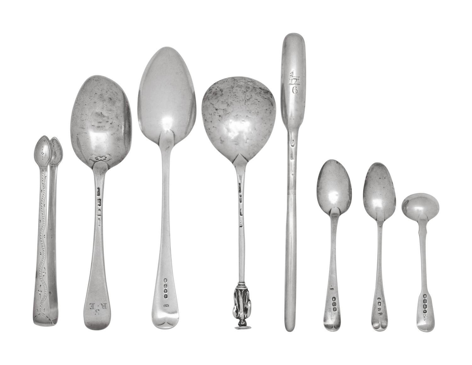 A Group of Eight English Silver Flatware Articles