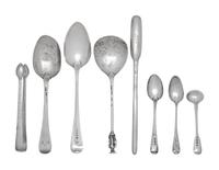 A Group of Eight English Silver Flatware Articles