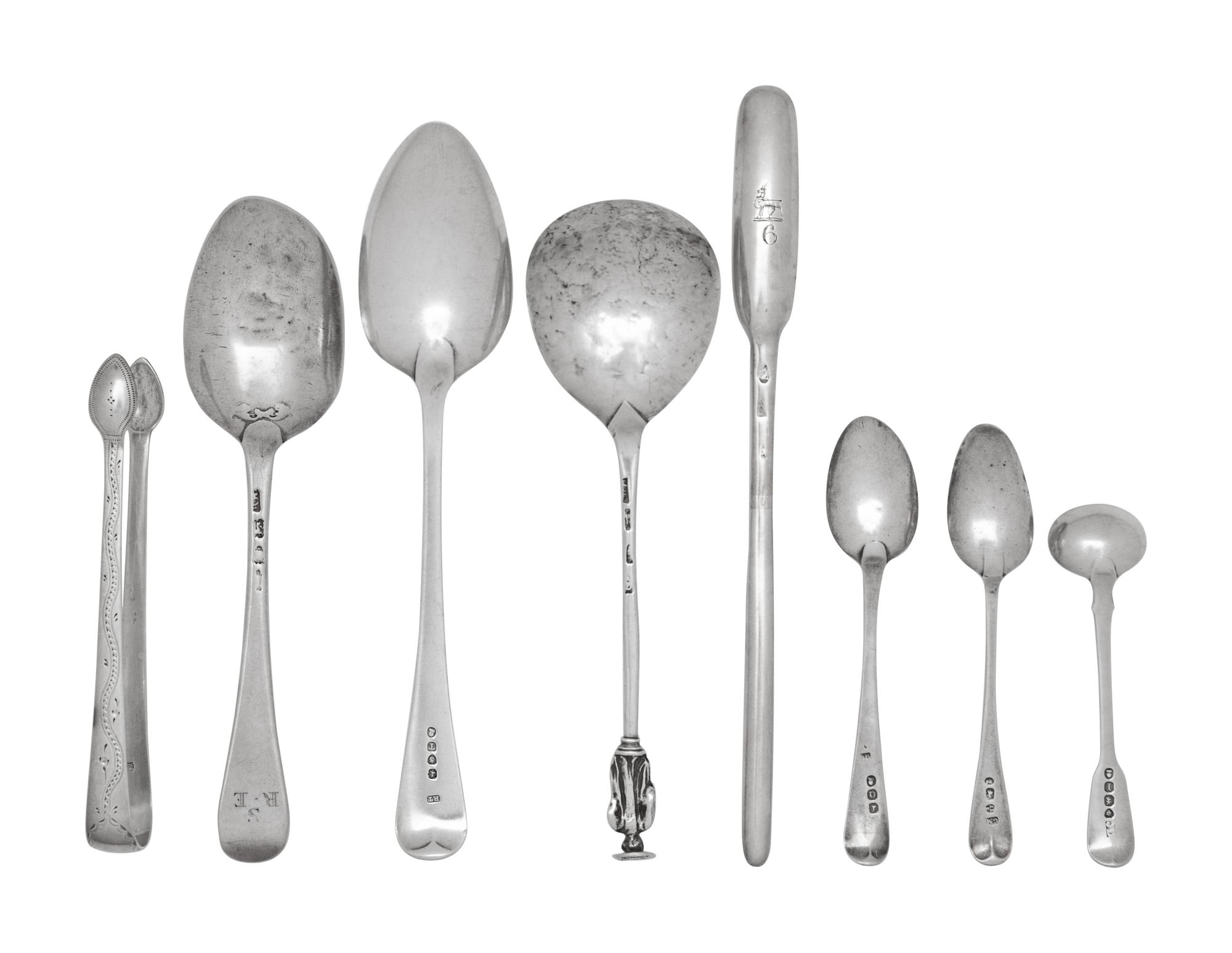 A Group of Eight English Silver Flatware Articles