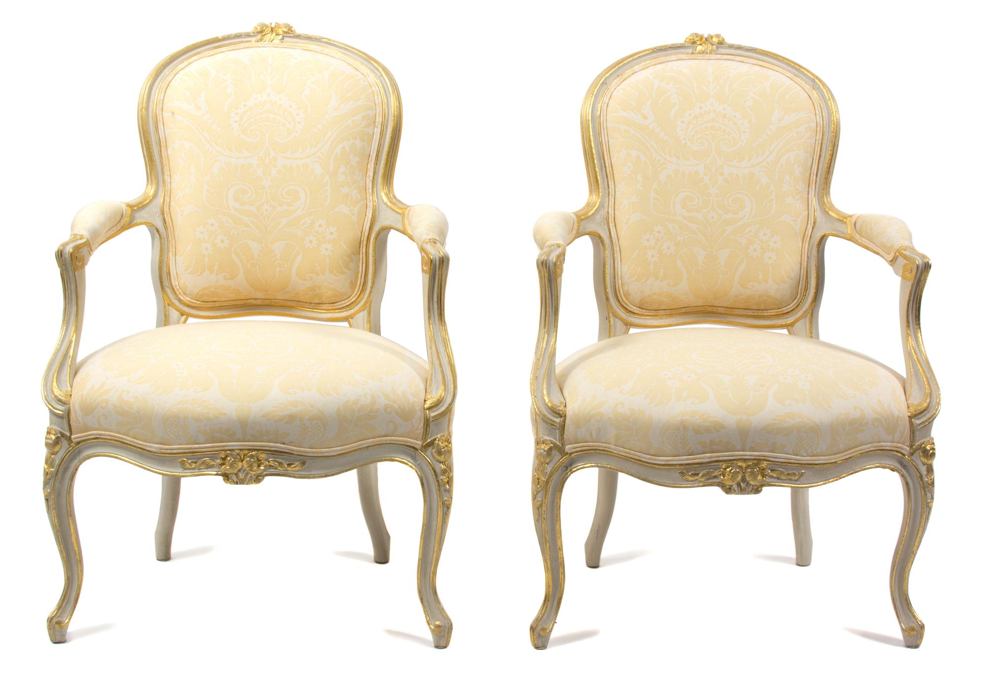 A Pair of Louis XV Style Painted Open Armchairs Height 34 1/2 x width 23 x depth 22 inches. — 20TH CENTURY