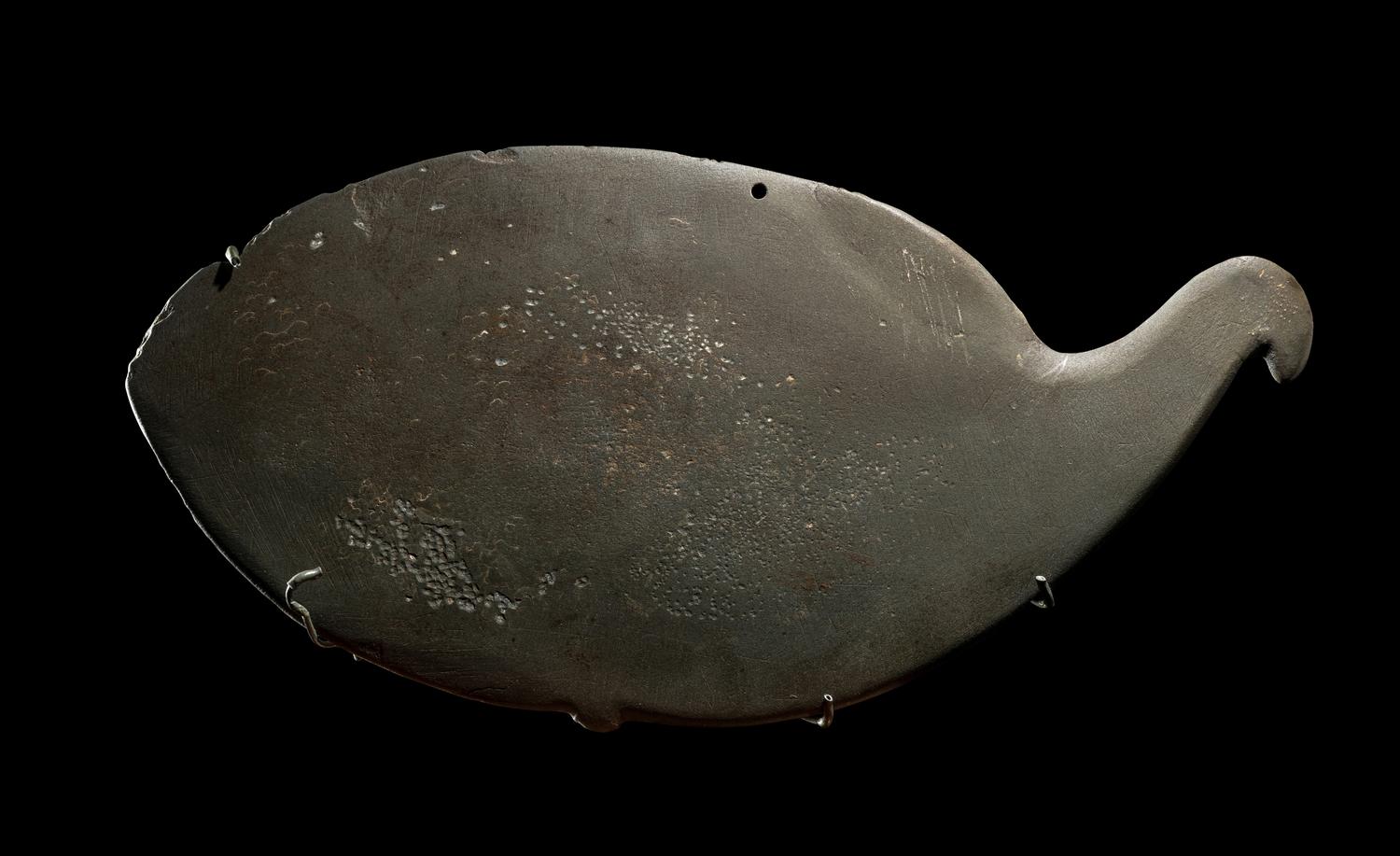An Egyptian Greywacke Cosmetic Palette in the Form of a Bird