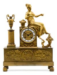 An Empire Gilt Bronze Mantel Clock Height 16 3/4 inches.