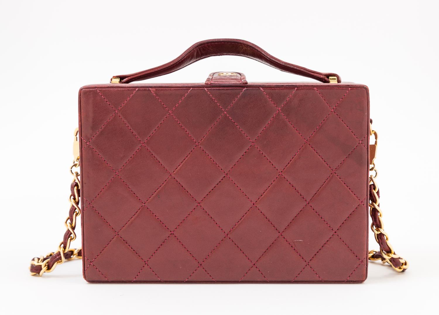A Chanel Burgundy Lambskin Quilted Box Bag, 7.5" x 5.25" x 2.5"; Strap drop: 18".