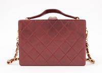 A Chanel Burgundy Lambskin Quilted Box Bag, 7.5" x 5.25" x 2.5"; Strap drop: 18".
