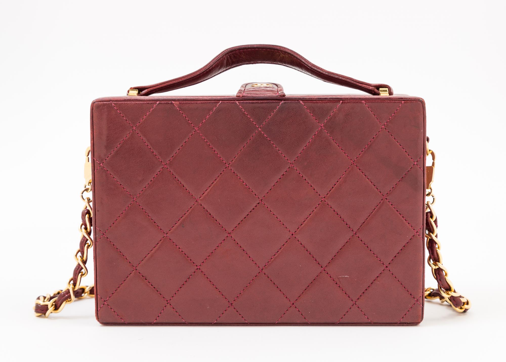 A Chanel Burgundy Lambskin Quilted Box Bag, 7.5" x 5.25" x 2.5"; Strap drop: 18".