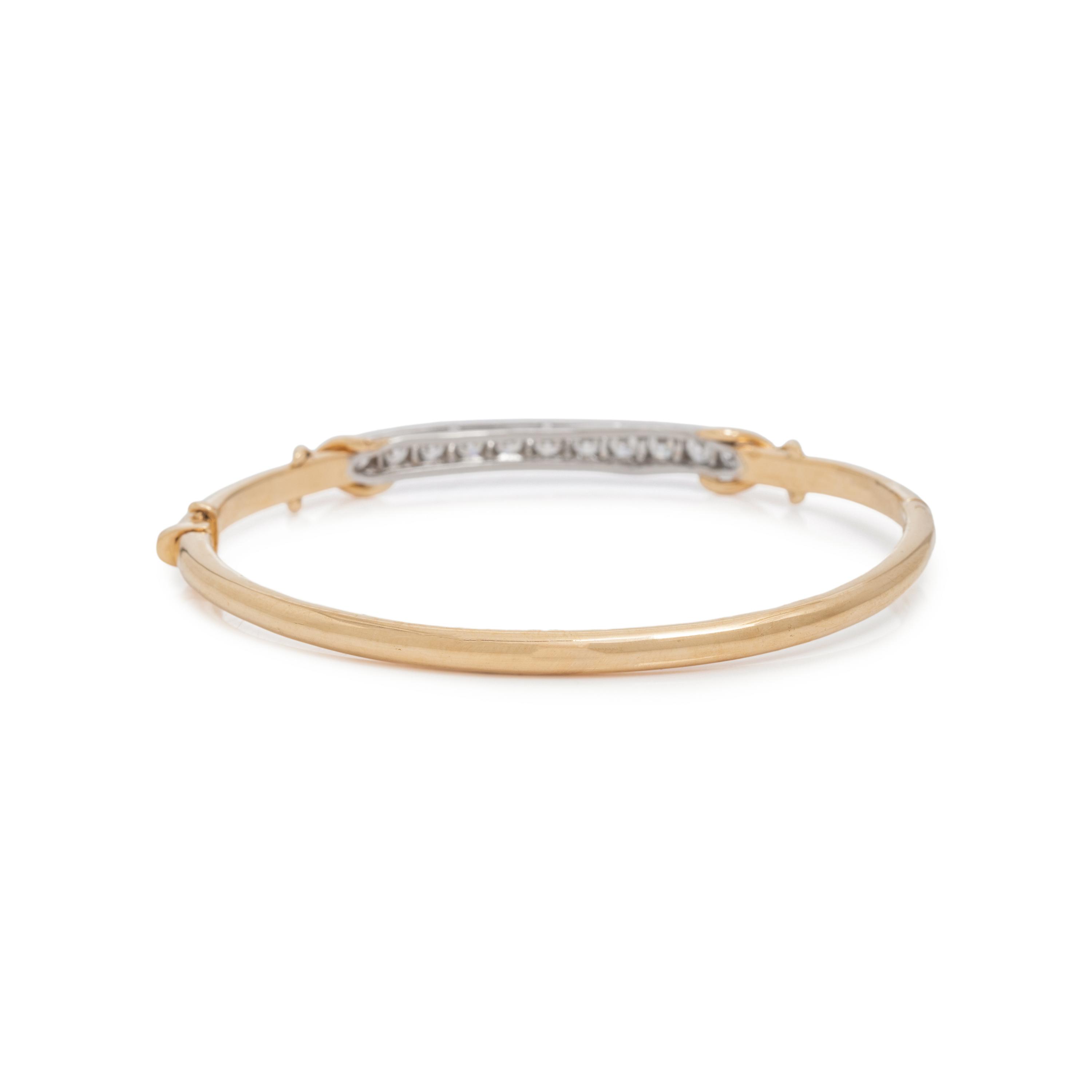 TIFFANY & CO., YELLOW GOLD, PLATINUM AND DIAMOND BANGLE BRACELET