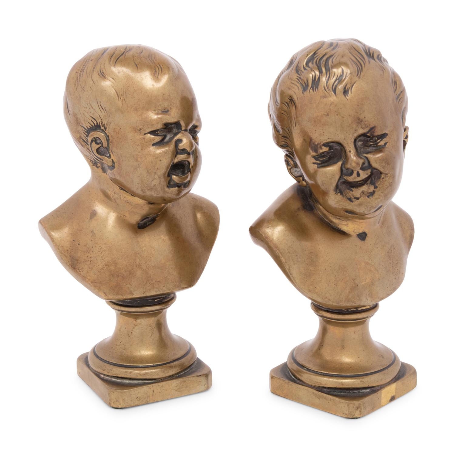 A Pair of Continental Bronze Busts of Infants