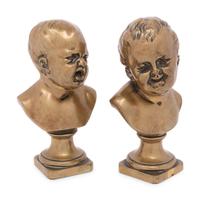 A Pair of Continental Bronze Busts of Infants