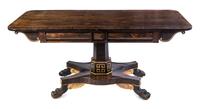 A Regency Parcel Gilt Rosewood Center Table Height 30 x width 65 x depth 28 inches. — FIRST QUARTER 19TH CENTURY