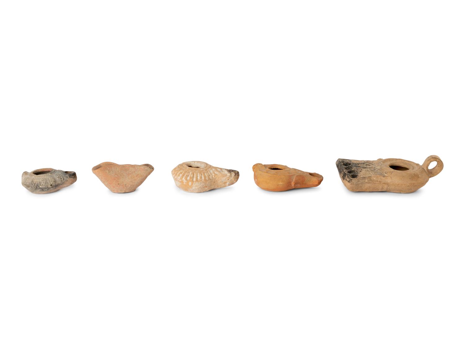Five Roman and Holy Land Terracotta Oil Lamps