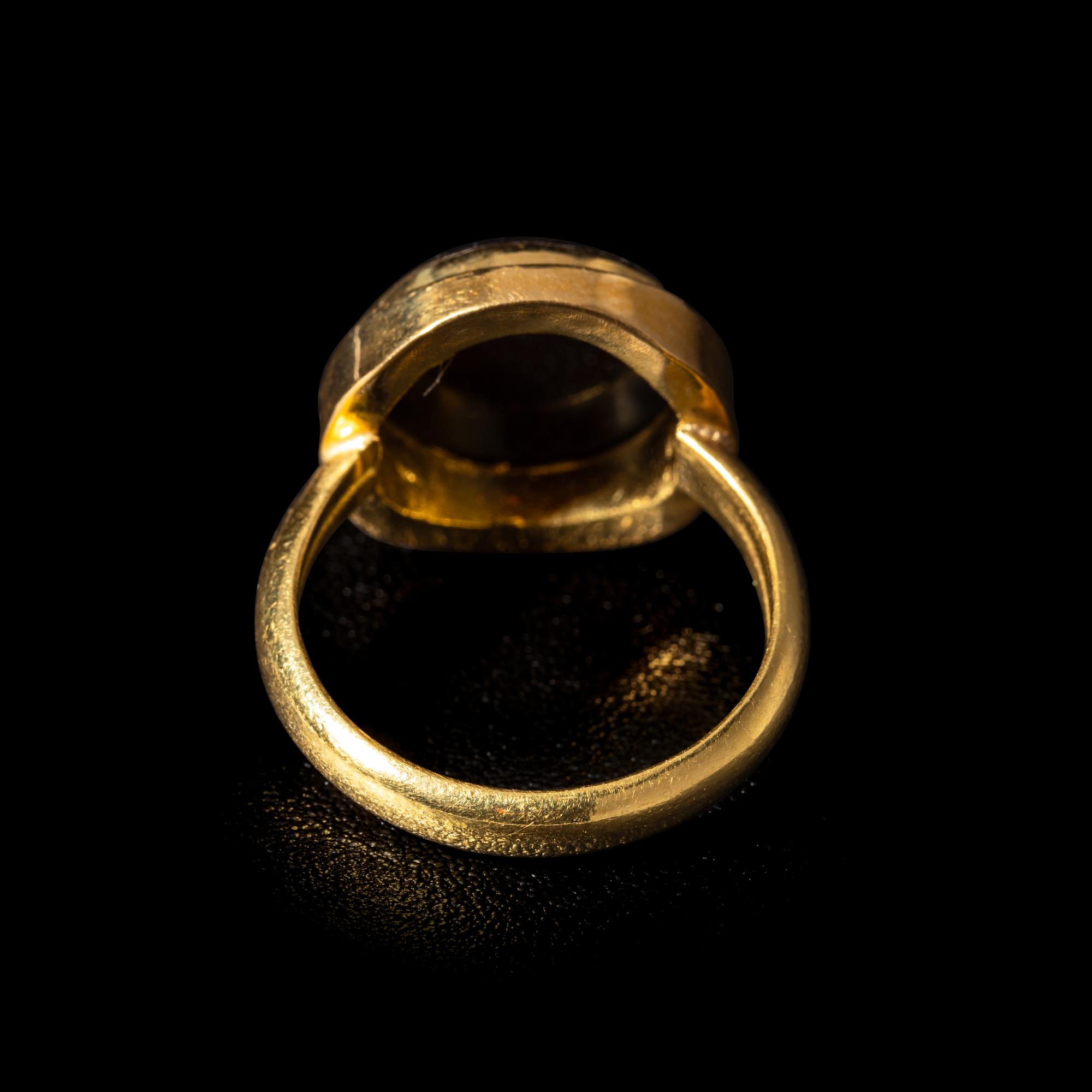 A Roman Carnelian Ring Stone with a Female Portrait Head — Set in a modern gold ring