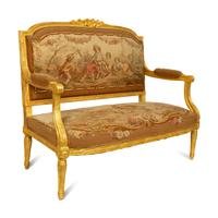 A Louis XVI Style Giltwood Settee with Tapestry Upholstery — LATE 19TH CENTURY
