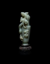 A Finely Carved Chinese Celadon Jade 'Chilong' Covered Vase