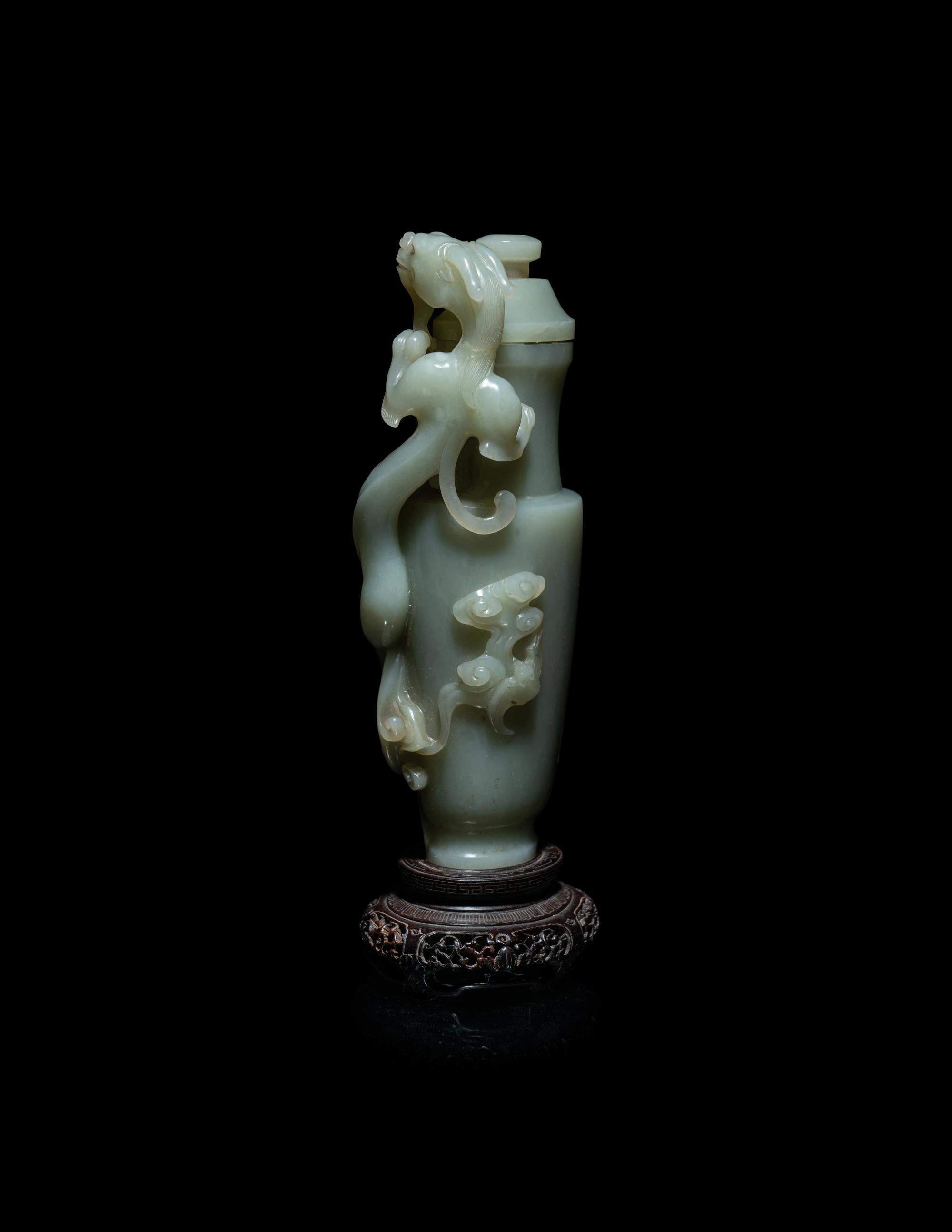 A Finely Carved Chinese Celadon Jade 'Chilong' Covered Vase