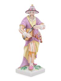 A Berlin (K.P.M.) Porcelain Figure of a Chinese Musician