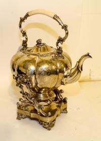 A German Silver-Plate Kettle and Stand. Height overall 17 inches.
