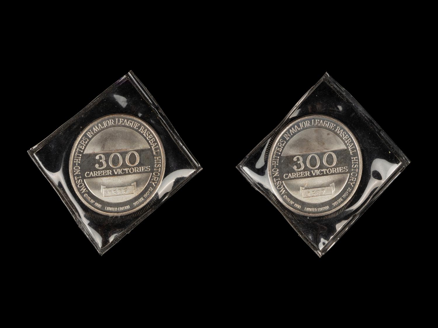 A Group of Nolan Ryan Enviromint Commemorative Coins Including One Quarter Troy Ounce .9999 Gold Coin,