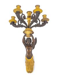 A Pair of Empire Style Gilt and Patinated Bronze Figural Five-Light Sconces