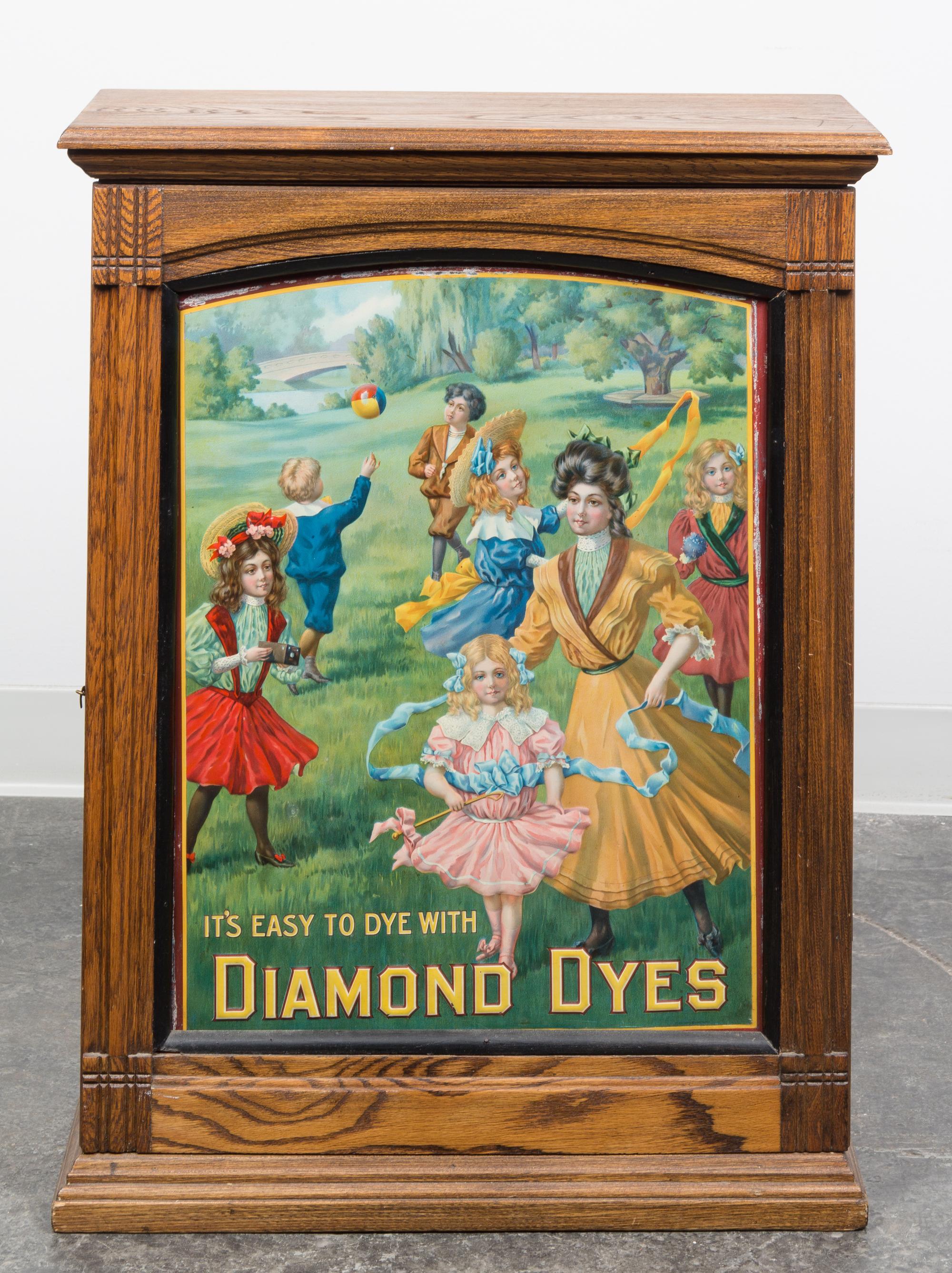 An American Oak Counter Top Display Cabinet for Diamond Dyes Height 29 1/2 x width 22 3/4 x depth 10 inches.