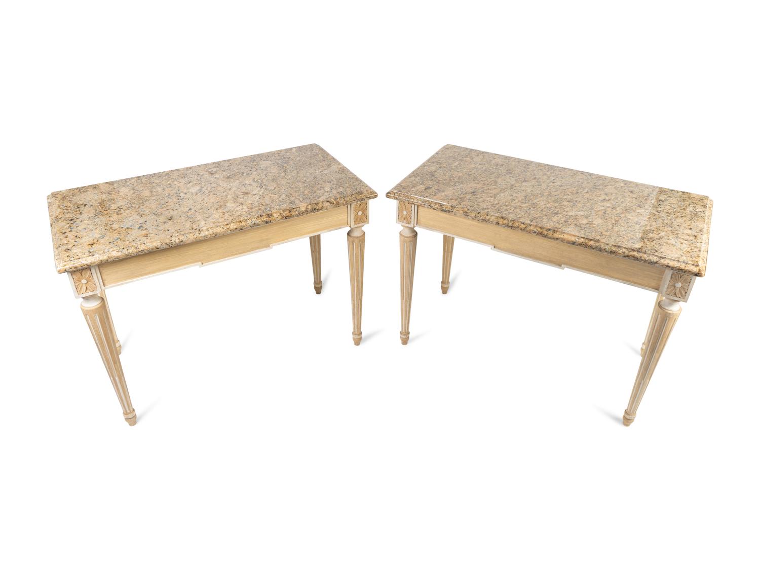 A Pair of Neoclassical Carved and Painted Console Tables with Granite Tops — 20TH CENTURY