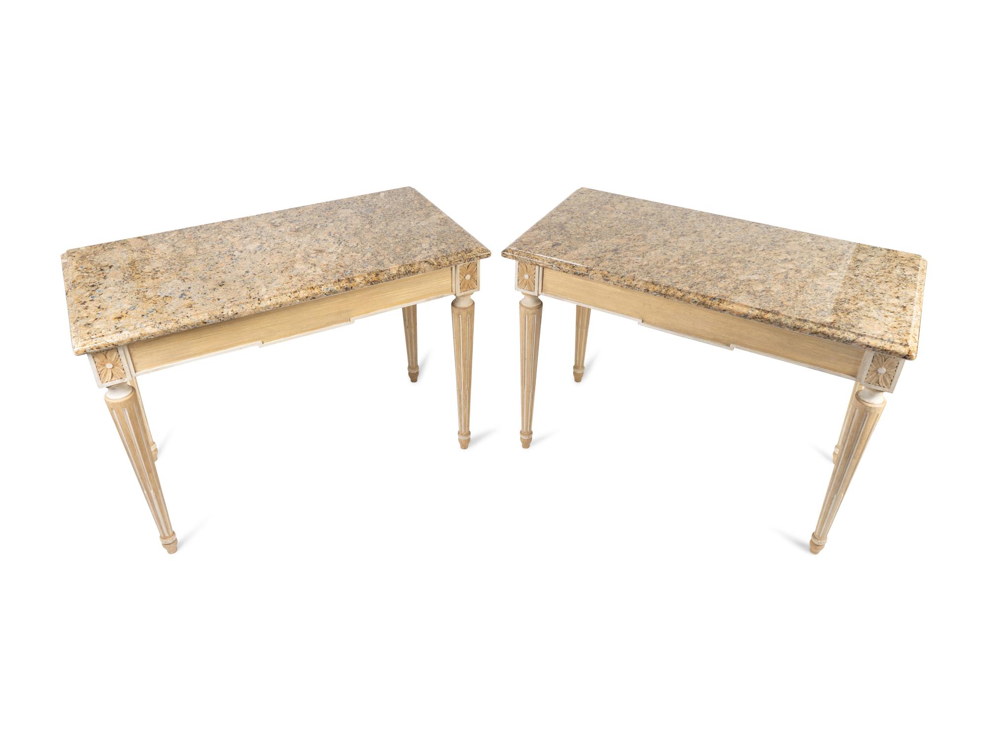 A Pair of Neoclassical Carved and Painted Console Tables with Granite Tops — 20TH CENTURY