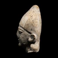 A Cypriot Limestone Votive Head