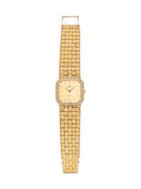 UNIVERSAL GENEVE, 18K YELLOW GOLD AND DIAMOND WRISTWATCH