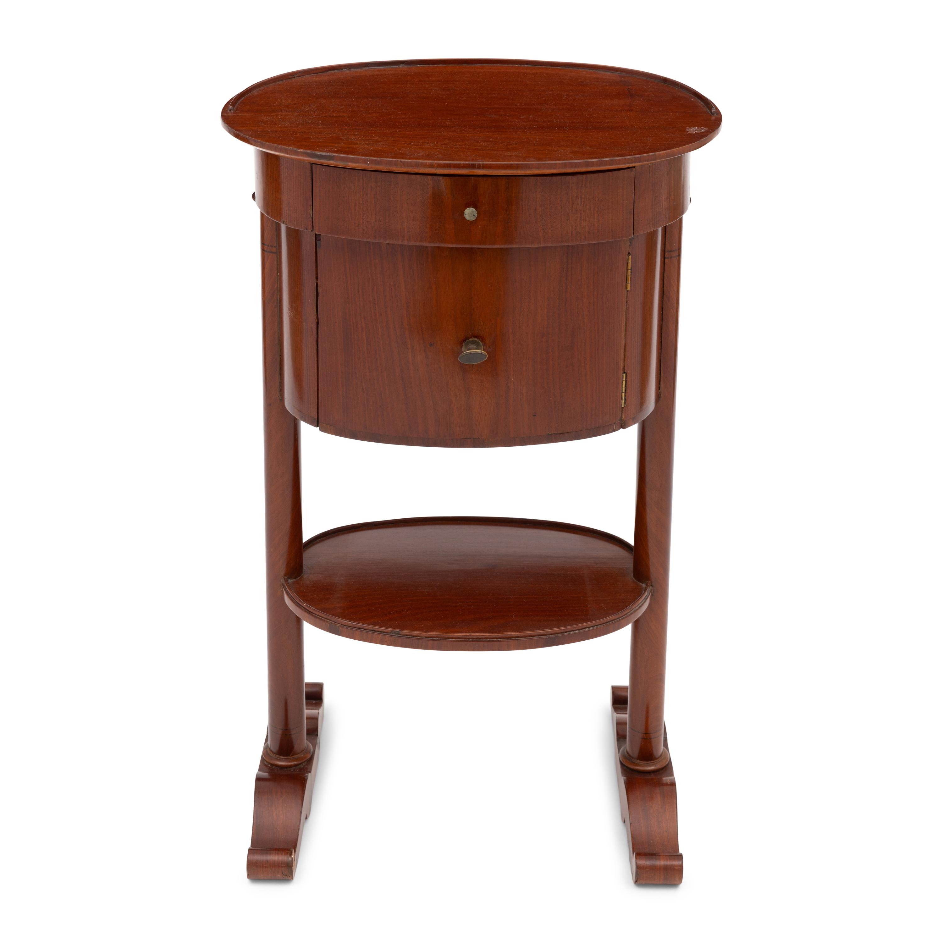 An Empire Style Mahogany Drum Table