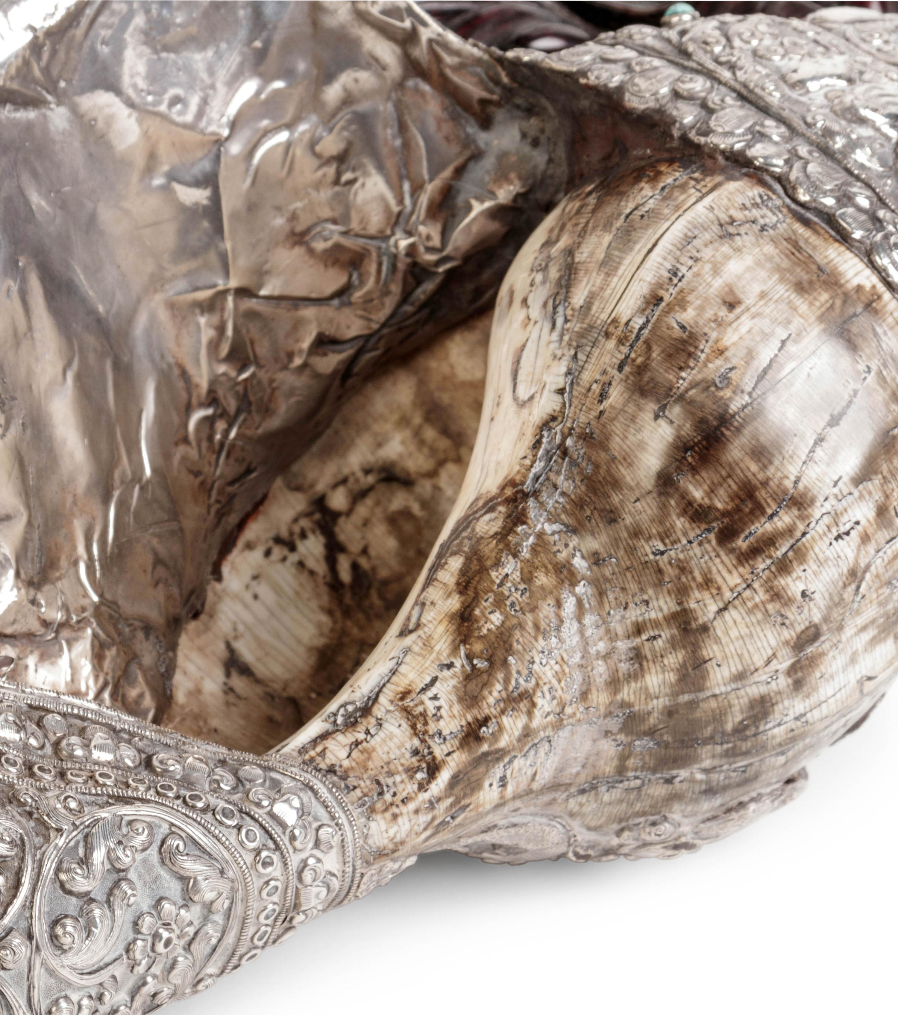 A Tibetan Silver Mounted Shell Horn