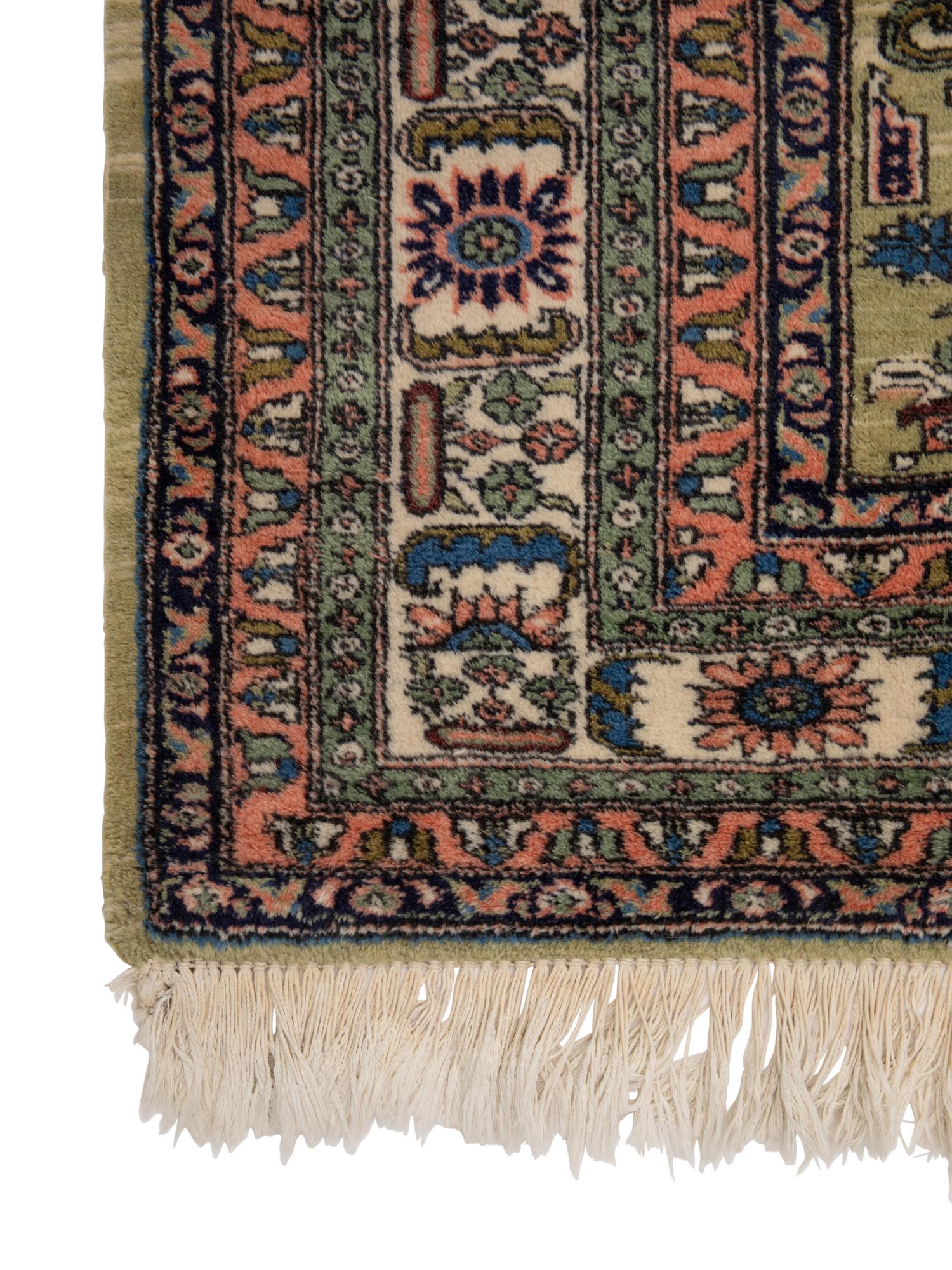 A Persian Ardabil Wool Rug