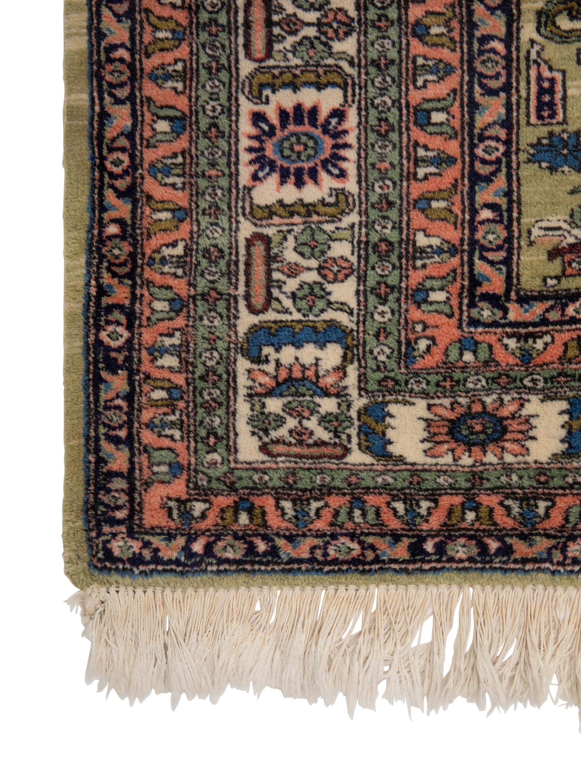 A Persian Ardabil Wool Rug