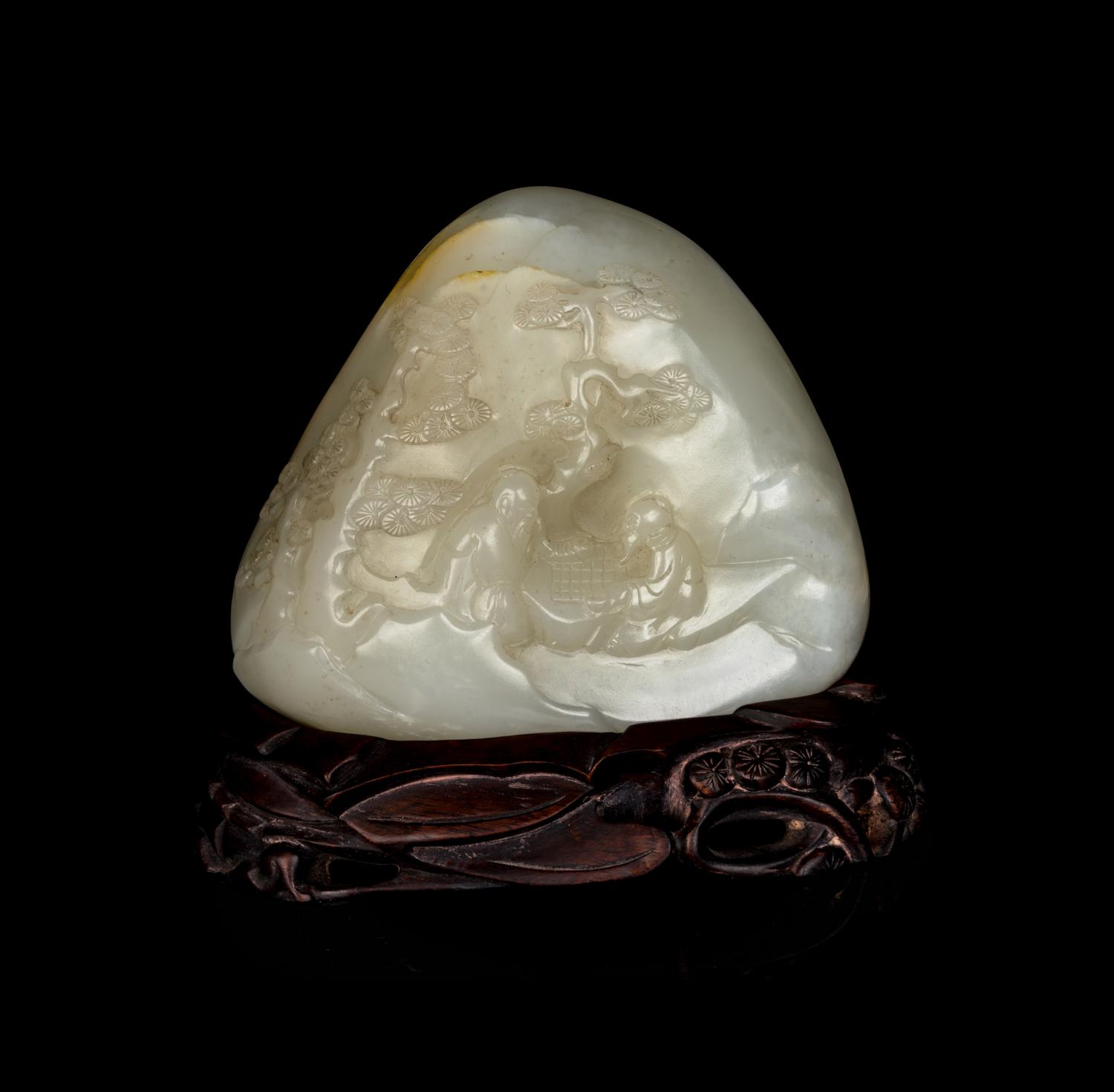 A Chinese White and Russet Jade Boulder
