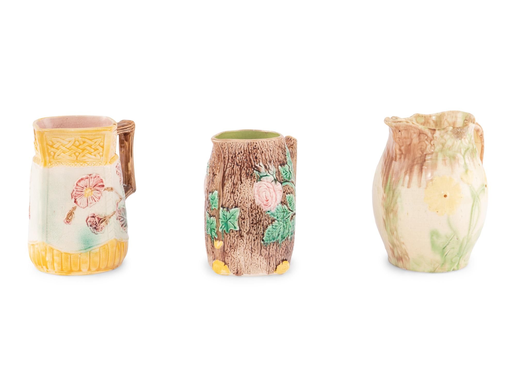 Three Large Glazed Earthenware Pitchers
